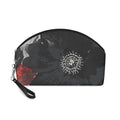 Black makeup bag with bold floral design 